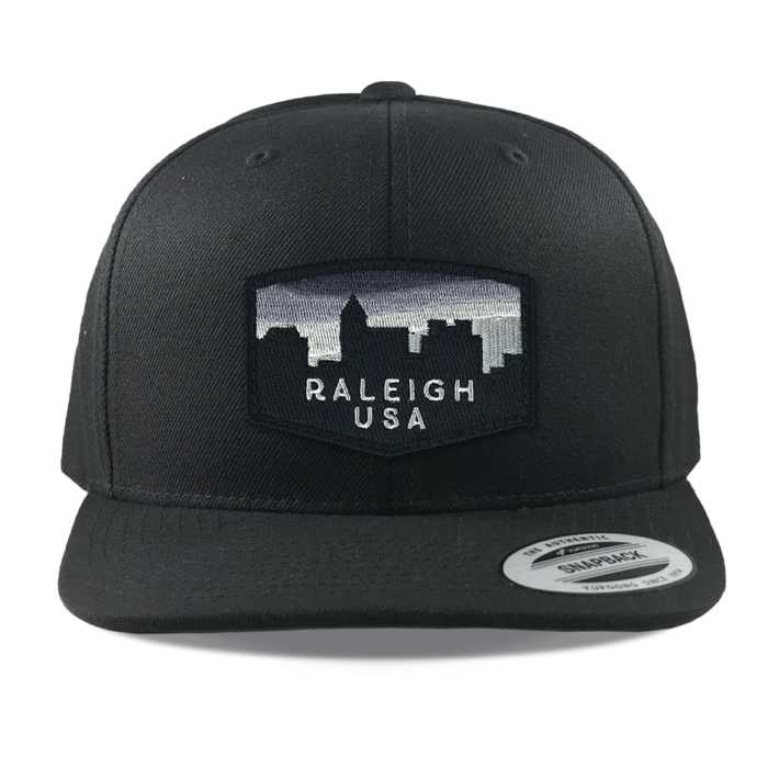 Yupoong-6089-black-snapback-flatbill-raleigh-skyline-embroidered-patch